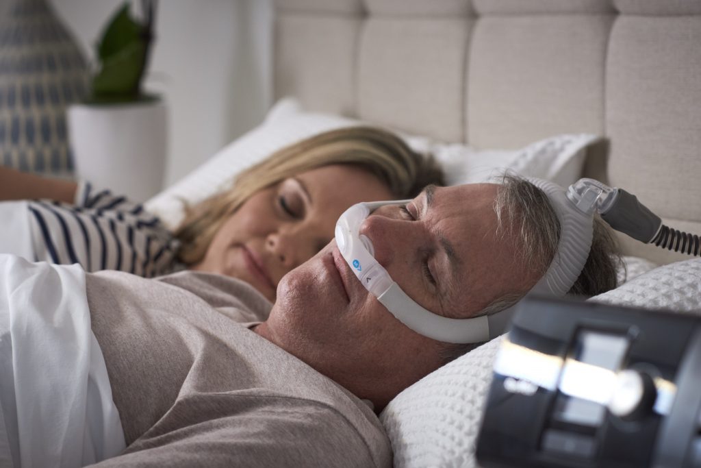 CPAP machine and mask used for sleep apnea therapy