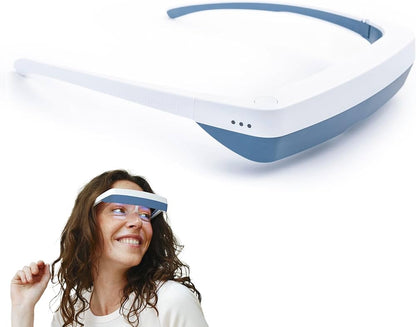 Woman smiling while wearing Luminette 3 Light Therapy Glasses on a white background