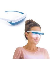Woman wearing Luminette 3 Light Therapy Glasses with a white background